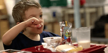 A child eating lunch.